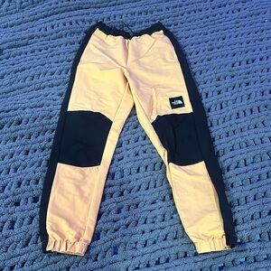 Orange North Face mens pants